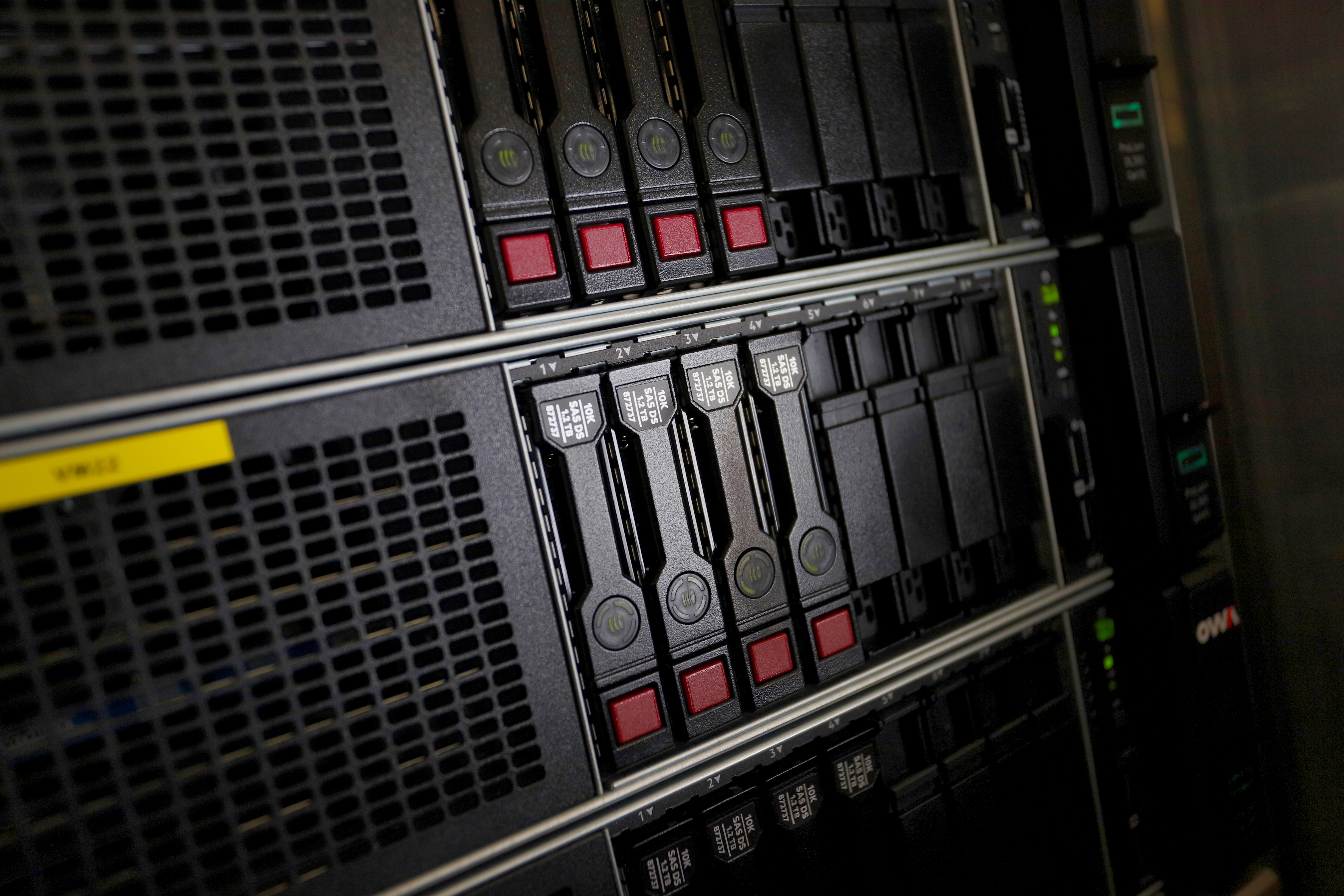 A close up of servers in a datacenter filled with disks.